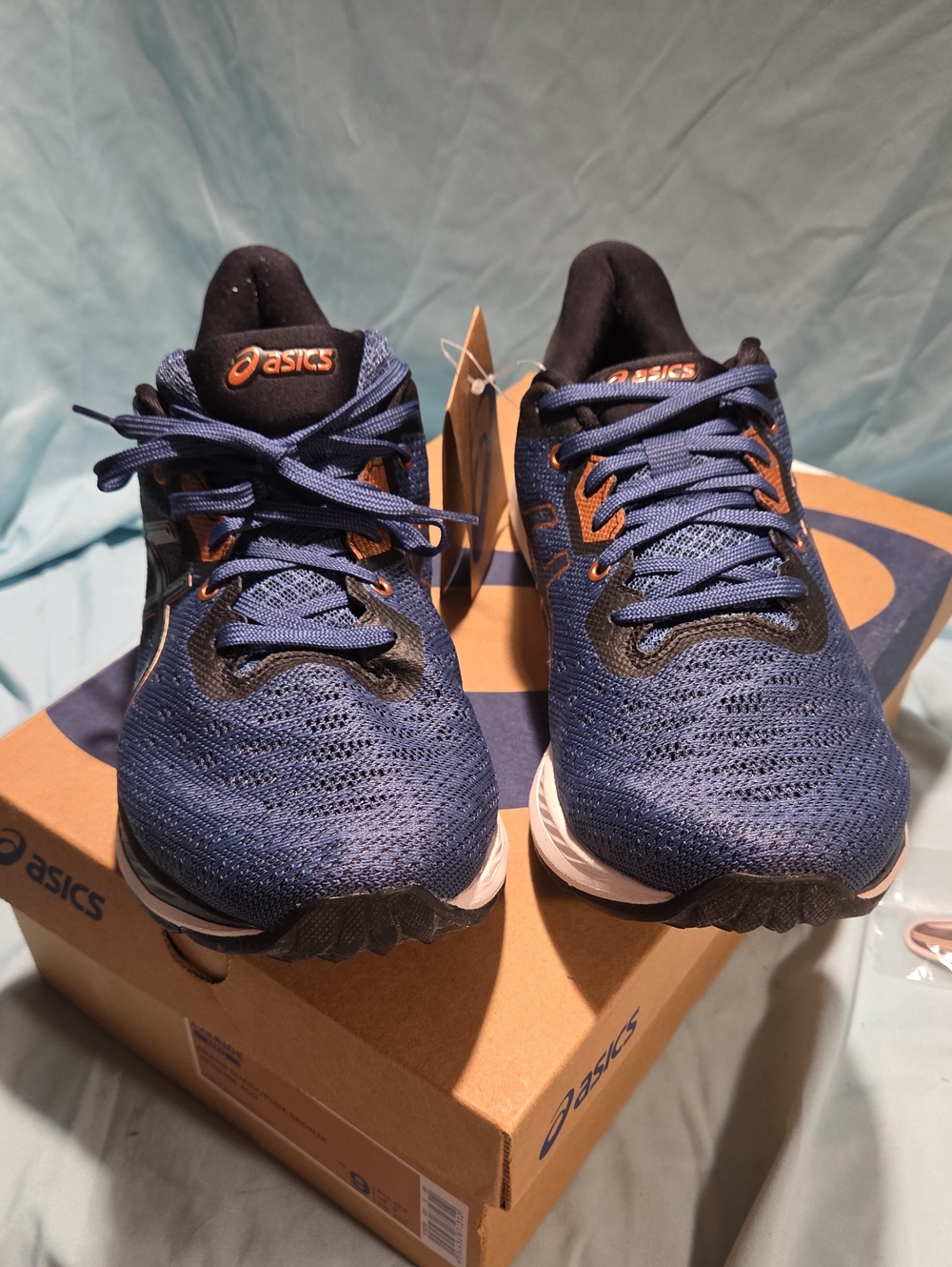 ASICS Men's Navy Blue Running Shoes with Orange Accents 9